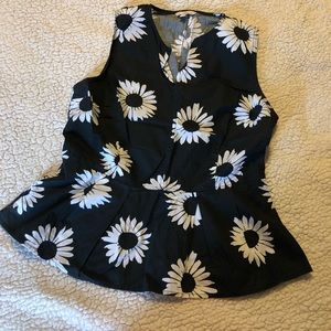 Peplum sleeveless blouse